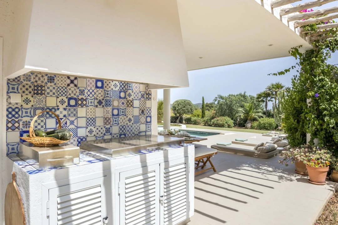 1681371810-Luxury real estate Ibiza to rent villa can Can Elisabeth spain property kitchen barbecue outside.webp